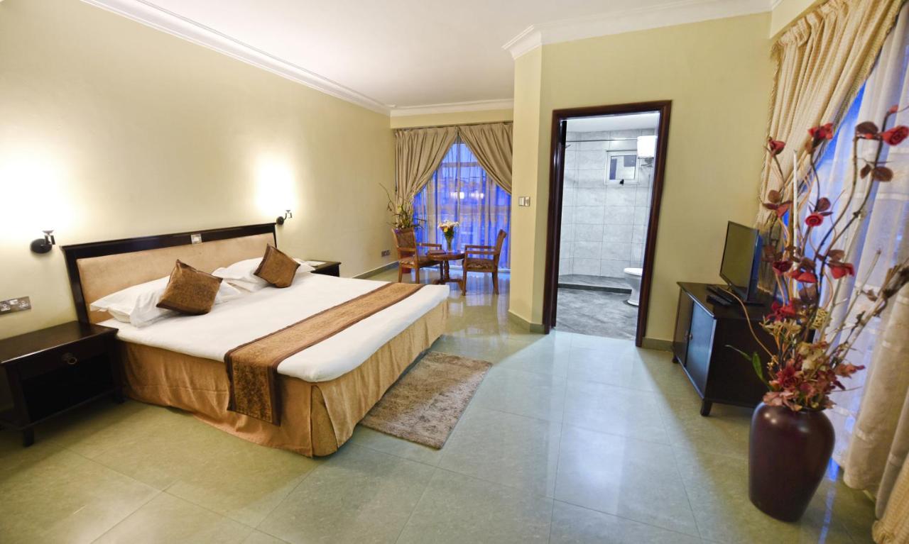 Hotel Sojovalo Кампала Экстерьер фото