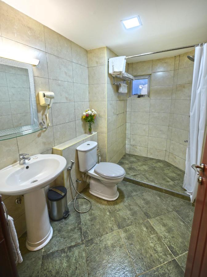 Hotel Sojovalo Кампала Экстерьер фото